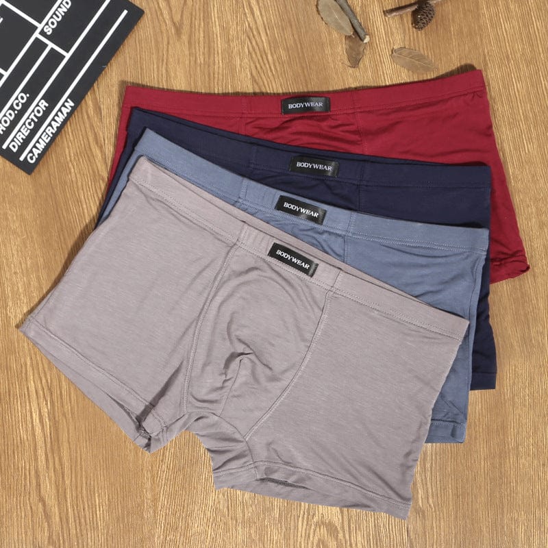 Pantalones cortos de ropa interior para hombre, ropa interior de color sólido, transpirable, informal, con ángulo plano, bolsa de cuatro pies, carga, venta al por mayor, novedad de 2021