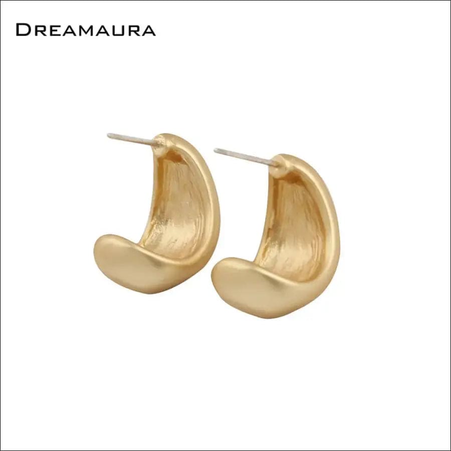 9 - 65076236-c-shaped-light-gold-grinding-earrings BROKER