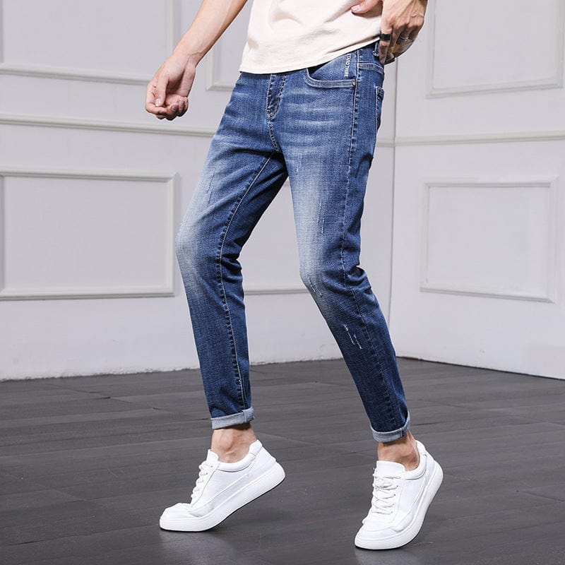 Jeans Pantalones para hombres Hombres 2021 Primavera y otoño Versión coreana de la tendencia del agujero Pantalones delgados de nueve pantalones con pies pantalones para hombres