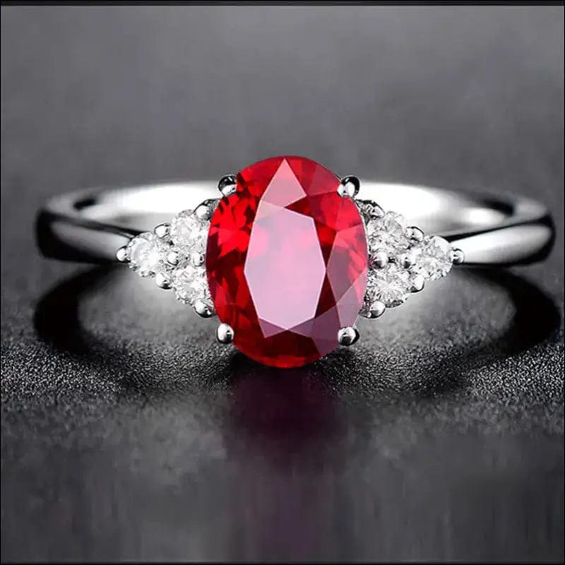 European and American hot elliptical red gem rings four-leg