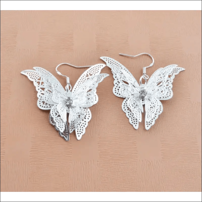 New hot ornaments hollow sharp butterfly earrings zircon