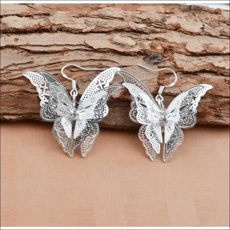 New hot ornaments hollow sharp butterfly earrings zircon