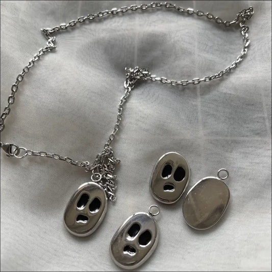 New INS tide small design ghost face necklace float titanium