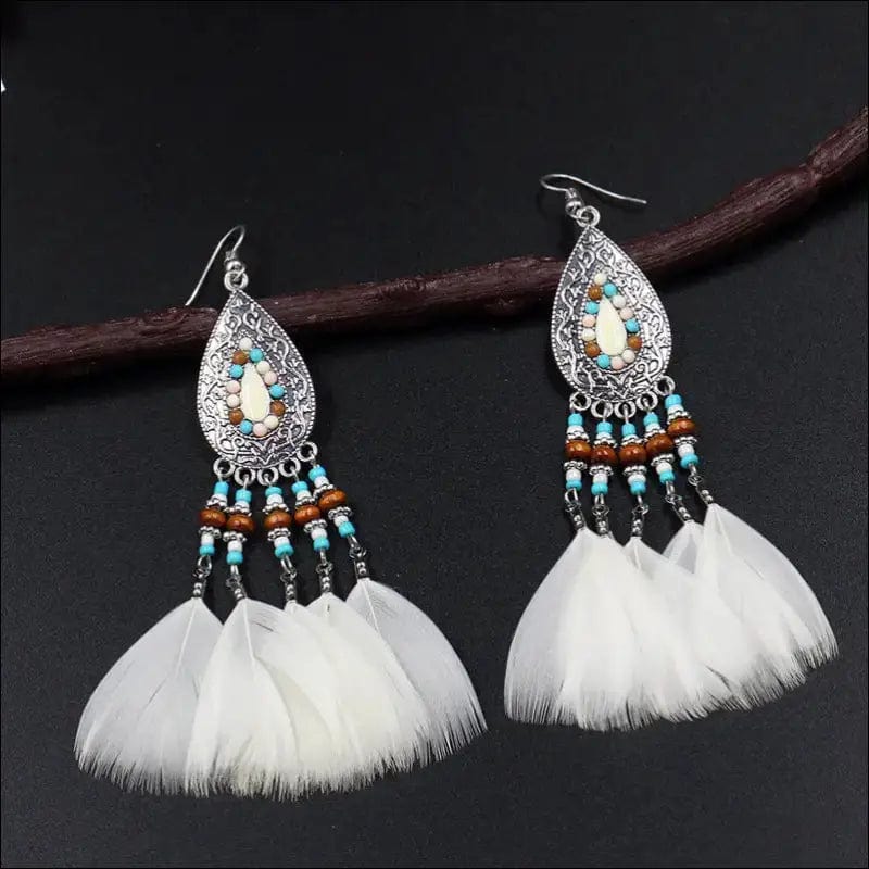 Retro fashion feather stream Supo earrings female handmade