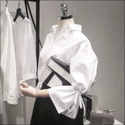 Spring Korean version of the loose V front long white shirt