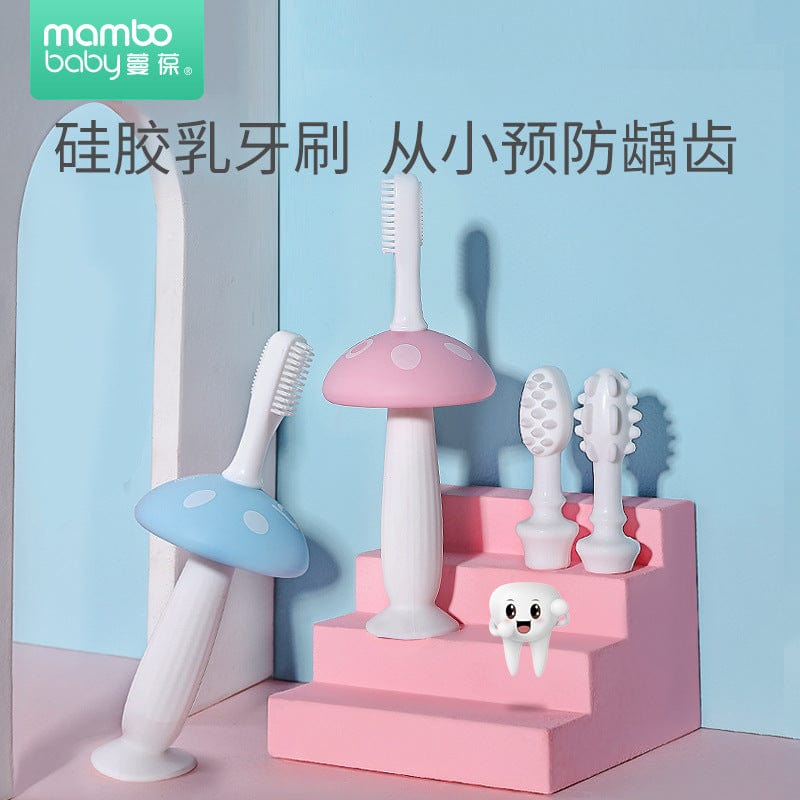Factory direct sales Manbao baby three-stage milk toothbrush infant silicone oral cleaning anti-moth toothbrush explosion model