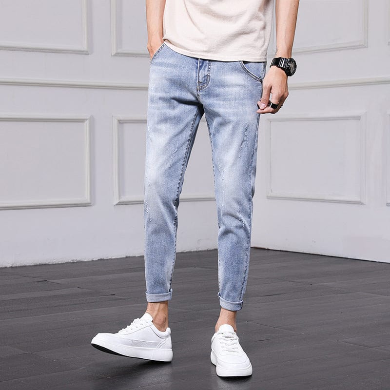 Jeans Pantalones para hombres Hombres 2021 Primavera y otoño Versión coreana de la tendencia del agujero Pantalones delgados de nueve pantalones con pies pantalones para hombres