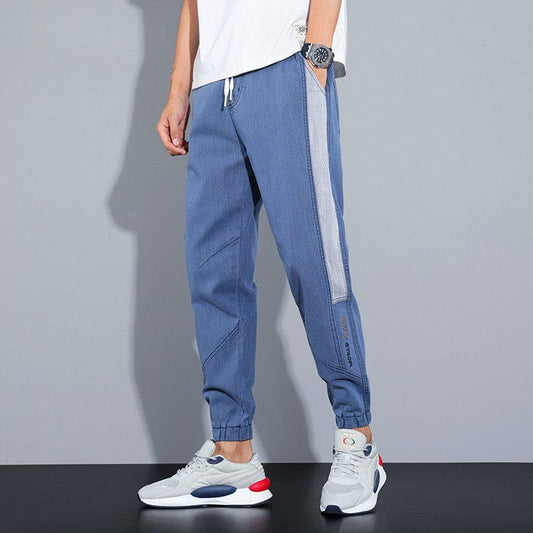 Four seasons imitation jeans men's new thin section blue foot pine close waist large size men's loose harem pants trend