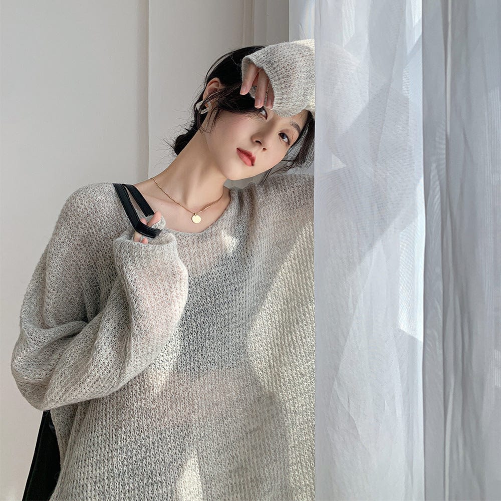 2021 Korean version of the autumn and winter new minimalist fashion lazy fan V-colored long section loose sweater female M399