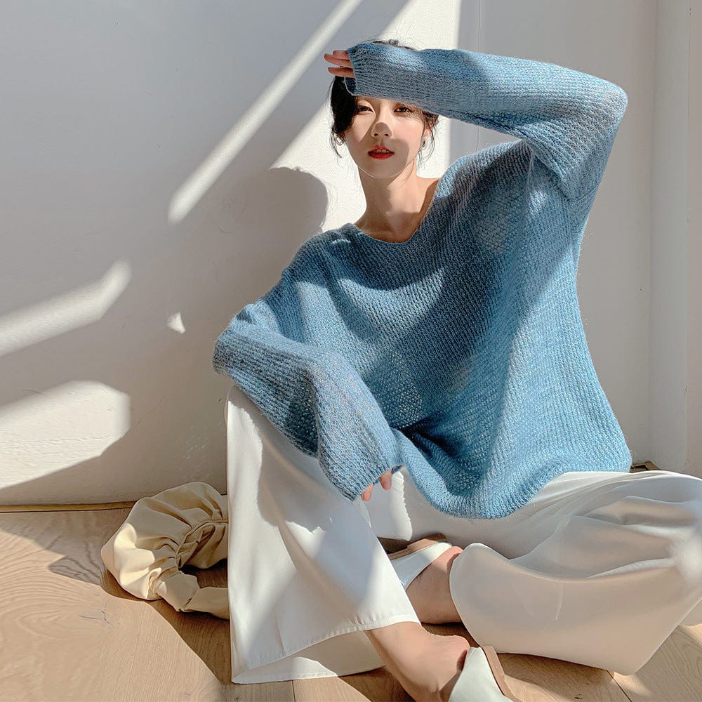 2021 Korean version of the autumn and winter new minimalist fashion lazy fan V-colored long section loose sweater female M399