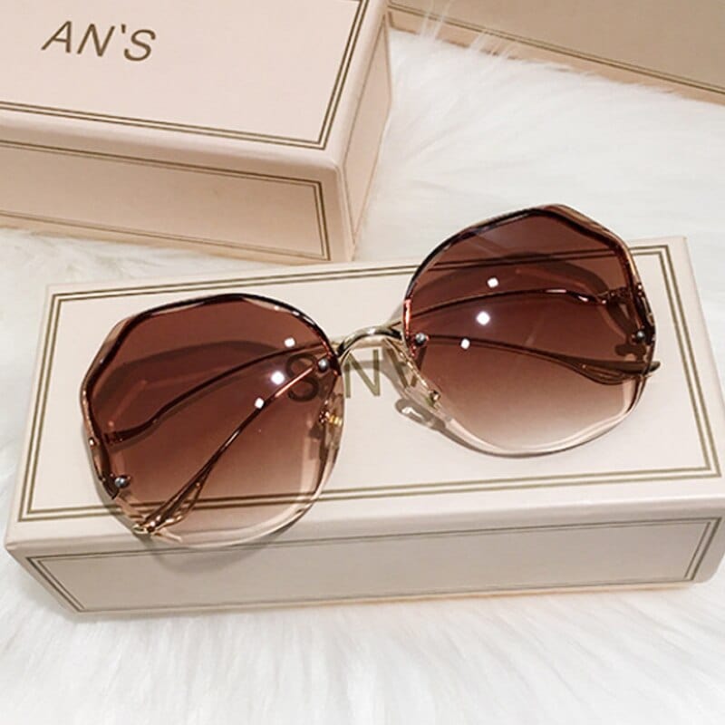 Irregular Round Sunglasses Women Brand Designer Gradient Fashion Sun Glasses Rimless Metal Curved Temples Oculus